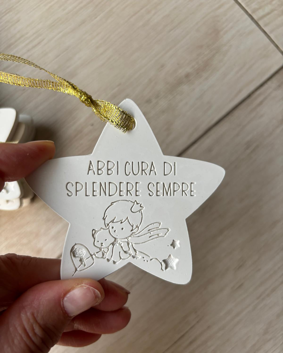 stella con frase abbi cura di splendere